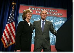 President George W. Bush is introduced by Donna Mindeck, First Vice President of the Pennsylvania State Association of Town Supervisors, before giving remarks on the USA Patriot Act in Hershey, Pa., Monday, April 19, 2004.  White House photo by Paul Morse
