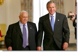 President George W. Bush and Israeli Prime Minister Ariel Sharon prior to talking with the press in the Cross Hall of the White House on April 14, 2004.  White House photo by Paul Morse