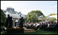 President George W. Bush and guests enjoy the entertainment of Cachao and his band during a Rose Garden celebration Wednesday, Oct. 10, 2007, of Hispanic Heritage Month. White House photo by Chris Greenberg