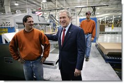 President George W. Bush meets with employees at Stribling Packaging Inc., Monday, Oct. 15, 2007 in Rogers, Ark., during a tour of the facility that specializes in the design of corrugated boxes and point-of-purchase displays. White House photo by Eric Draper