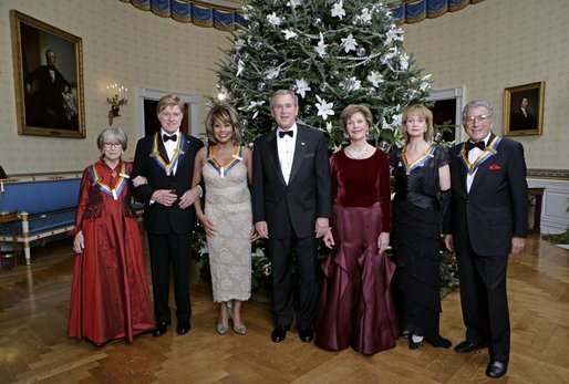 President George W. Bush and Laura Bush pose with the Kennedy Center honorees, from left to right, actress Julie Harris, actor Robert Redford, singer Tina Turner, ballet dancer Suzanne Farrell and singer Tony Bennett, Sunday, Dec. 4, 2005, during the reception in the Blue Room at the White House. White House photo by Eric Draper