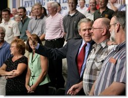 President George W. Bush greets the audience after delivering remarks on CAFTA-DR at Gaston College in Dallas, N.C., Friday, July 15, 2005.  White House photo by Eric Draper