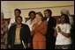 Laura Bush stands with U.S. Ambassador to South Africa Jendayi Frazer, left, during her visit to Centre for the Book, an institution established to create a culture of literacy in South Africa, Tuesday, July 12, 2005, in Cape Town. White House photo by Krisanne Johnson