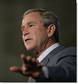 President George W. Bush gestures as he addresses the Hispanic Alliance for Free Trade, Thursday, July 21, 2005, at the Organization of American States in Washington. President Bush thanked the group for their support of CAFTA.  White House photo by Eric Draper