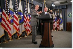 President George W. Bush, appearing at the U.S. Department of Energy, Monday, Sept. 26, 2005 in Washington, talks about the effects of Hurricane Rita on the energy situation in the Gulf of Mexico. President Bush is joined by U.S. Energy Secretary Samuel W. Bodman and U.S. Interior Secretary Gale Norton.  White House photo by Paul Morse