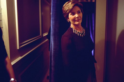 Laura Bush waits backstage before addressing the crowd gathered for the Second Annual National Book Festival Gala Friday, October 11, 2002 at the Library of Congress. White House photo by Susan Sterner.
