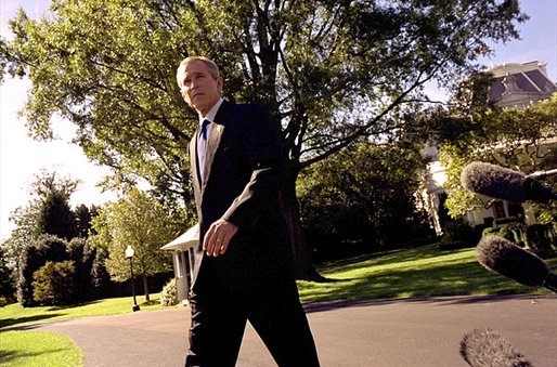 President George W. Bush discusses recent terrorist attacks on the Indonesian island of Bali on the South Lawn Monday, Oct. 14. "We've got to continue to work together; those of us who love freedom must work together to do everything we can to disrupt, deny, and bring to justice these people who have no soul, no conscience, people who hate freedom," said the President. White House photo by Paul Morse.