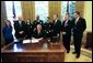 President George W. Bush signs HR 5467, The Department of Homeland Security Appropriations Act for the Fiscal Year 2005, in the Oval Office Monday, Oct. 18, 2004. White House photo by Tina Hager