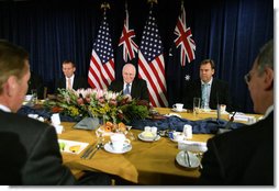 Vice President Dick Cheney is flanked by Tony Abbott, left, Australian Minister for Health and Ageing, and Robert McClelland, Shadow Minister for Foreign Affairs, during a breakfast meeting Friday, Feb. 23, 2007, at the Shangri-La Hotel in Sydney. White House photo by David Bohrer