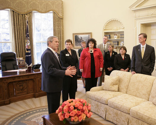 President George W. Bush offers a tour of the Oval Office to the leaders of military service organizations Wednesday, Feb. 28, 2007, following a meeting with the group to thank them for their dedication and commitment in support of America's military and their families at home. White House photo by Eric Draper