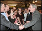 President George W. Bush shakes hands with employees and guests following his participation at an energy forum discussion and tour at Novozymes North America, Inc., Thursday, Feb. 22, 2007 in Franklinton, N.C. White House photo by Paul Morse