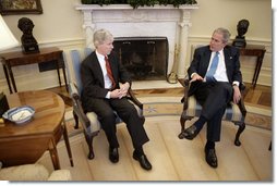 President George W. Bush meets with Ambassador Ryan Crocker, Ambassador-Designee to Iraq, in the Oval Office Friday, Feb. 16, 2007.  White House photo by Eric Draper