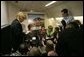 Laura Bush talks with members of the press pool aboard Air Force One during a flight to Amman, Jordan, Thursday, May 19, 2005. White House photo by Krisanne Johnson