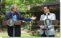 President George W. Bush speaks during a press conference with Egyptian President Hosni Mubarak after their meeting at Camp David, Saturday, June 8. President Bush said 