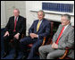 President George W. Bush joins Northern Ireland First Minister Peter Robinson, right, and Deputy First Minister Martin McGuinness, left, during their meeting Monday, June 16. 2008, at Stormont Castle in Belfast, Northern Ireland. White House photo by Chris Greenberg
