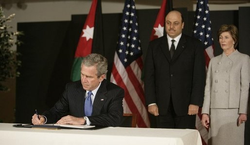 President George W. Bush and Mrs. Laura Bush, visit the Embassy of Jordan to sign a book of condolence, Thursday, Nov. 10, 2005 in Washington, in remembrance of those killed in the terrorist attacks, Wednesday, in Jordan. White House photo by Eric Draper
