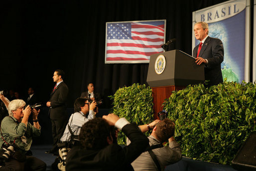 The media swarms President George W. Bush Saturday, Nov. 6, 2005, as he speaks at Blue Tree Stars Hall in Brasilia, Brazil, prior to his departure for Panama. White House photo by Krisanne Johnson