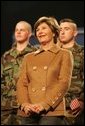 Mrs. Laura Bush smiles as she listens to the President’s introduction Monday, Nov. 14, 2005, at Elmendorf Air Force Base in Anchorage, Alaska, where he delivered remarks on the War on Terror to the troops. White House photo by Shealah Craighead