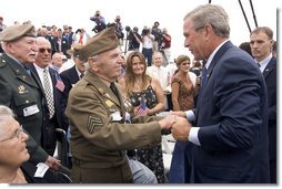 President George W. Bush greets a veteran after delivering remarks to commemorate the 60th anniversary of V-J Day at the Naval Air Station in San Diego, Calif., August 30, 2005. White House photo by Paul Morse