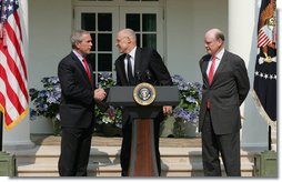 President George W. Bush shakes the hand of Henry Paulson after nominating him Tuesday, May 30, 2006, as Treasury Secretary to replace Secretary John Snow, right, who announced his resignation. White House photo by Shealah Craighead