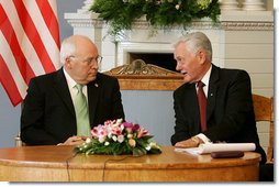 Vice President Dick Cheney listens to Lithuanian President Valdus Adamkus during a bilateral meeting held at the Presidential Palace in Vilnius, Lithuania, Wednesday, May 3, 2006. During the meeting the two leaders discussed their mutual determination to further the rise of democracy in the region.  White House photo by David Bohrer