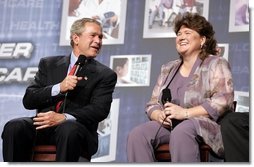 President George W. Bush participates in a conversation on health care information technology with Jennifer Queen at Vanderbilt University in Nashville, Tenn., May 27, 2004.  White House photo by Paul Morse