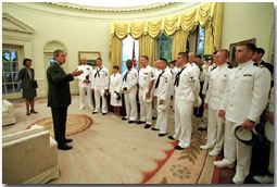 President George W. Bush talks to the crew of the VQ-1 in the Oval Office Friday, May 18. WHITE HOUSE PHOTO BY PAUL MORSE