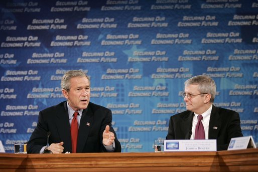 President George W. Bush and Joshua Bolten, director of the Office of Management and Budget, talk during a White House economic conference at the Ronald Reagan Building and International Trade Center in Washington, D.C., Thursday, Dec. 16, 2004. Mr. Bolten was the moderator for the session titled “Financial Challenges for Today and Tomorrow.” White House photo by Paul Morse