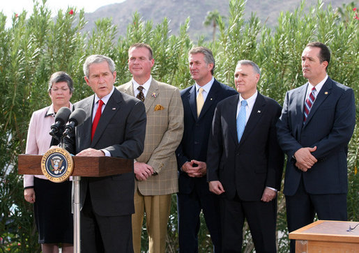 President George W. Bush is joined by Arizona legislators as he delivers his remarks at the signing ceremony for H.R. 5441, the Department of Homeland Security Appropriations Act for fiscal year 2007, Wednesday, Oct. 4, 2006, in Scottsdale. From left are: Arizona Gov. Janet Napolitano, Rep. J.D. Hayworth, Rep. Rick Renzi, Sen. Jon Kyl, R-Ariz., and Rep. Trent Franks. President Bush stressed, "This legislation will give us better tools to enforce our immigration laws and to secure our southern border." White House photo by Eric Draper