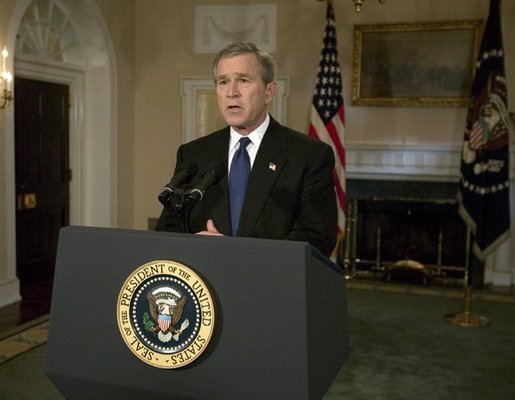 President George W. Bush addresses the nation on the capture of Saddam Hussein from the Cabinet Room, Sunday, Dec. 14, 2003. White House photo by Eric Draper.