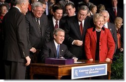 President George W. Bush signs H. R. 1, the Medicare Prescription Drug, Improvement and Modernization Act of 2003, at Constitution Hall in Washington, D.C., Dec. 8, 2003. "With this law, we are providing more access to comprehensive exams, disease screenings, and other preventative care, so that seniors across this land can live better and healthier lives," said President Bush.  White House photo by Paul Morse