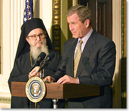 President Bush speaks with leaders of the Greek community in the White House.