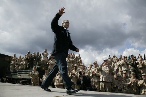 President George W. Bush receives cheers before giving remarks to military personnel at Fort Polk, La., Tuesday, Feb. 17, 2004. "In the war, America depends on our military to meet the dangers abroad and to keep our country safe," said the President. "The American people appreciate this sacrifice. And our government owes you more than gratitude." White House photo by Paul Morse.