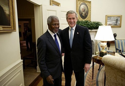 President George W. Bush welcomes United Nations Secretary General Kofi Annan to the Oval Office Tuesday, Feb. 3, 2004. After their meeting, they addressed the press. White House photo by Paul Morse