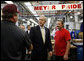 President George W. Bush meets employees of Meyer Tool Inc. Monday, Sept. 25, 2006 in Cincinnati, Ohio, while taking tour of the facility and stressed how important small businesses are to the nation’s economic vitality. White House photo by Paul Morse