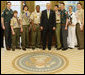 President George W. Bush welcomes Boy Scout representatives to the Oval Office Tuesday, March 4, 2008, as they presented him with their Report to the Nation, highlighting the 2007 accomplishments of the Boy Scouts of America. White House photo by Eric Draper
