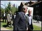 President George W. Bush talks with Canadian Prime Minister Stephen Harper Tuesday, Aug. 21, 2007, following their joint news conference with Mexico’s President Felipe Calderón at the North American Leaders’ Summit in Montebello, Quebec. White House photo by Eric Draper