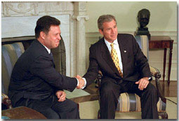 President Bush and King Abdullah of Jordan hold a joint press conference in the Oval Office Sept. 28. "Jordan is a strong, strong friend of America," said the President in his remarks. White House photo by Paul Morse.