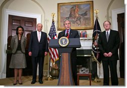 President George W. Bush nominates John Negroponte as Deputy Secretary of State, left, and Vice Admiral Mike McConnell as Director of National Intelligence during an announcement in the Roosevelt Room Friday, Jan. 5, 2007. Secretary of State Condoleezza Rice is pictured at left. White House photo by Paul Morse