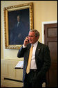 President George W. Bush congratulates San Francisco Giants' Barry Bonds in a phone call from the U.S. Department of the Treasury, Wednesday, Aug. 8. 2007. Mr. Bonds hit his record-breaking 756th home run during last night's game against the Washington Nationals in San Francisco. White House photo by Chris Greenberg