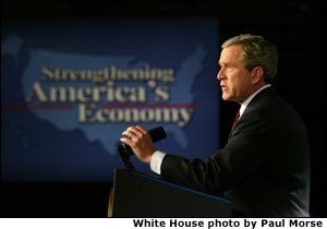 President George W. Bush speaks to the Economic Club of Chicago, Ill., about his growth and jobs plan to strengthen the American economy Tuesday, January 7, 2003. White House photo by Paul Morse. White House photo by Paul Morse