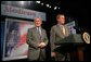 President George W. Bush is introduced by his brother Florida Governor Jeb Bush before delivering remarks on the Medicare Prescription Drug Benefit in Sun City Center, Florida, Tuesday, May 9, 2006. White House photo by Eric Draper