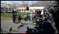 President George W. Bush speaks to reporters on the South Lawn of the White House Wednesday, Dec. 21, 2005, before boarding Marine One for Maryland. Urging Senate to reauthorize the Patriot Act and pass the defense bill, the President said, "There is an enemy that lurks, a dangerous group of people that want to do harm to the American people ... and we must have the tools necessary to protect the American people." White House photo by Kimberlee Hewitt