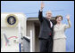 President George W. Bush and Mrs. Laura Bush wave from Air Force One Sunday, March 11, 2007. President Bush traveled from Uruguay to Bogot�, Colombia, where he was honored by an arrival ceremony at Casa de Narino. White House photo by Eric Draper