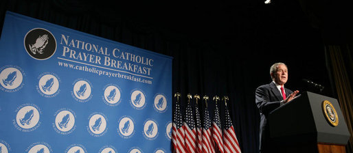 President George W. Bush smiles as he speaks at the National Catholic Prayer Breakfast Friday, April 18, 2008, at the Washington Hilton Hotel. Speaking about his visit this week with Pope Benedict XVI, the President said, "The Holy Father strongly believes that to whom much is given much is required -- and he is a messenger of God's call to love our neighbors as we'd like to be loved ourselves." White House photo by Chris Greenberg