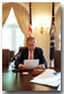 President George W. Bush records the weekly radio address for Cinco de Mayo in the Cabinet Room. This is the first time that a president has recorded the radio address in Spanish and in English. White House photo by Eric Draper