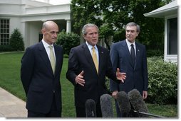 President George W. Bush, center, joined by Homeland Security Secretary Michael Chertoff, left, and Commerce Secretary Carlos Gutierrez, right, makes a statement on immigration reform Thursday, May 17, 2007 on the South Lawn of the White House. "I want to thank the members of the Senate who worked hard, said President Bush. "I appreciate the leadership shown on both sides of the aisle. As I reflect upon this important accomplishment, important first step toward a comprehensive immigration bill, it reminds me of how much the Americans appreciate the fact that we can work together -- when we work together they see positive things."  White House photo by Joyce N. Boghosian