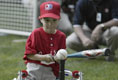 President George W. Bush hosts Tee Ball on the South Lawn with The Oriole Advocates Challengers of Marley Area Little League of Glen Burnie, Maryland and The Ridley Police Challengers of Leedom Little League, Ridley Park, Pennsylvania, July 27, 2003.