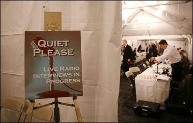 A sign requesting quiet is displayed at the entrance to the radio interview area at the White House, as radio journalist attend the White House Radio Day Tuesday, Oct. 24, 2006.