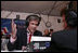 White House Press Secretary Tony Snow speaks with radio host Charlie Thomas of KDRO radio from Sedalia, Mo., during the White House Radio Day event Tuesday, Oct. 24, 2006 in Washington, D.C.